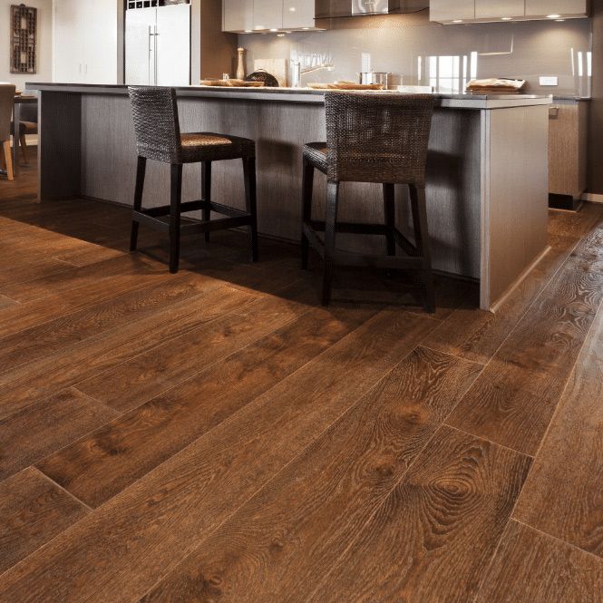 Timber Laminate Flooring With Two Chairs On It — Cairns Floors and More In Bungalow, QLD