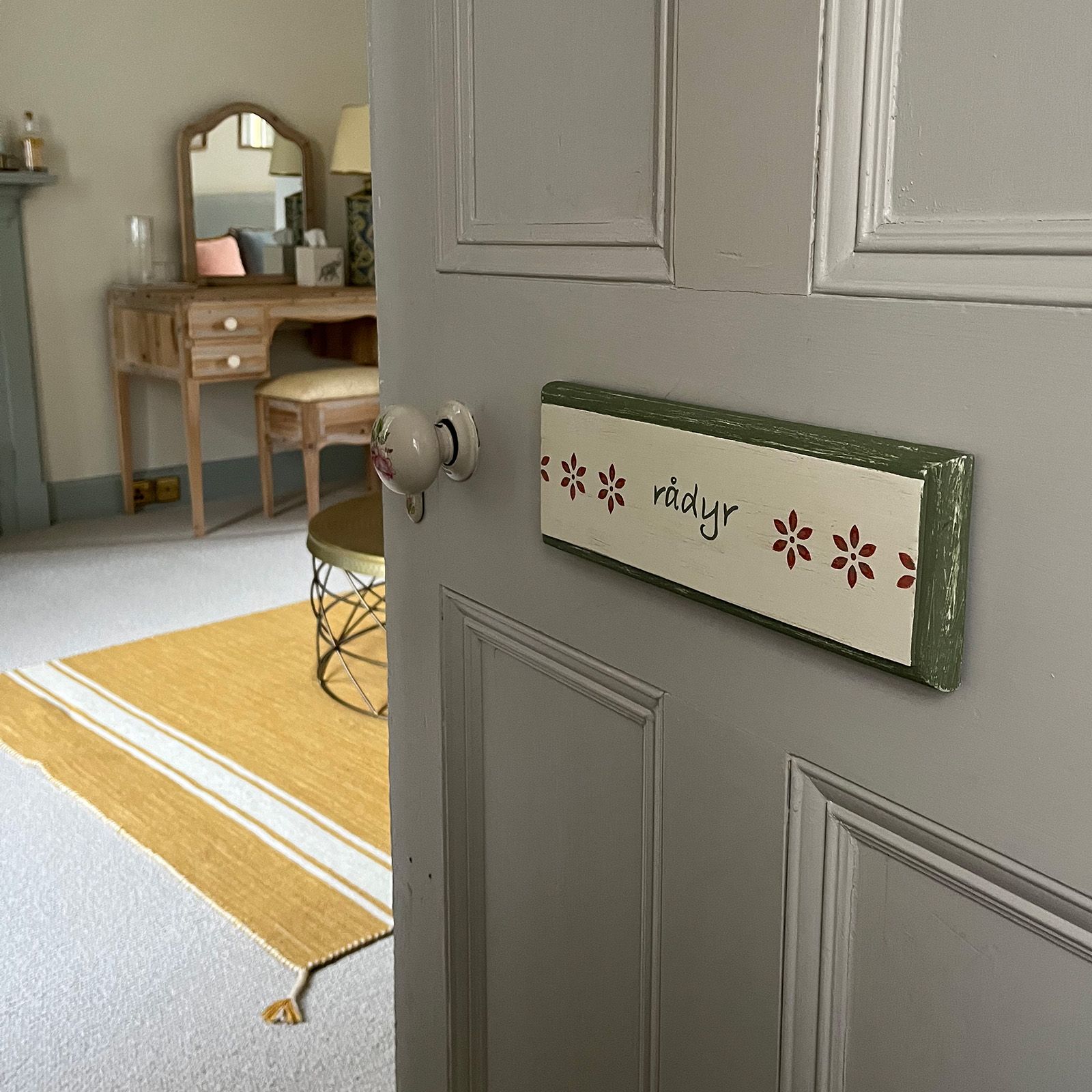 Bespoke bedroom sign on site. Designed by Helen Bateman, decorative artist