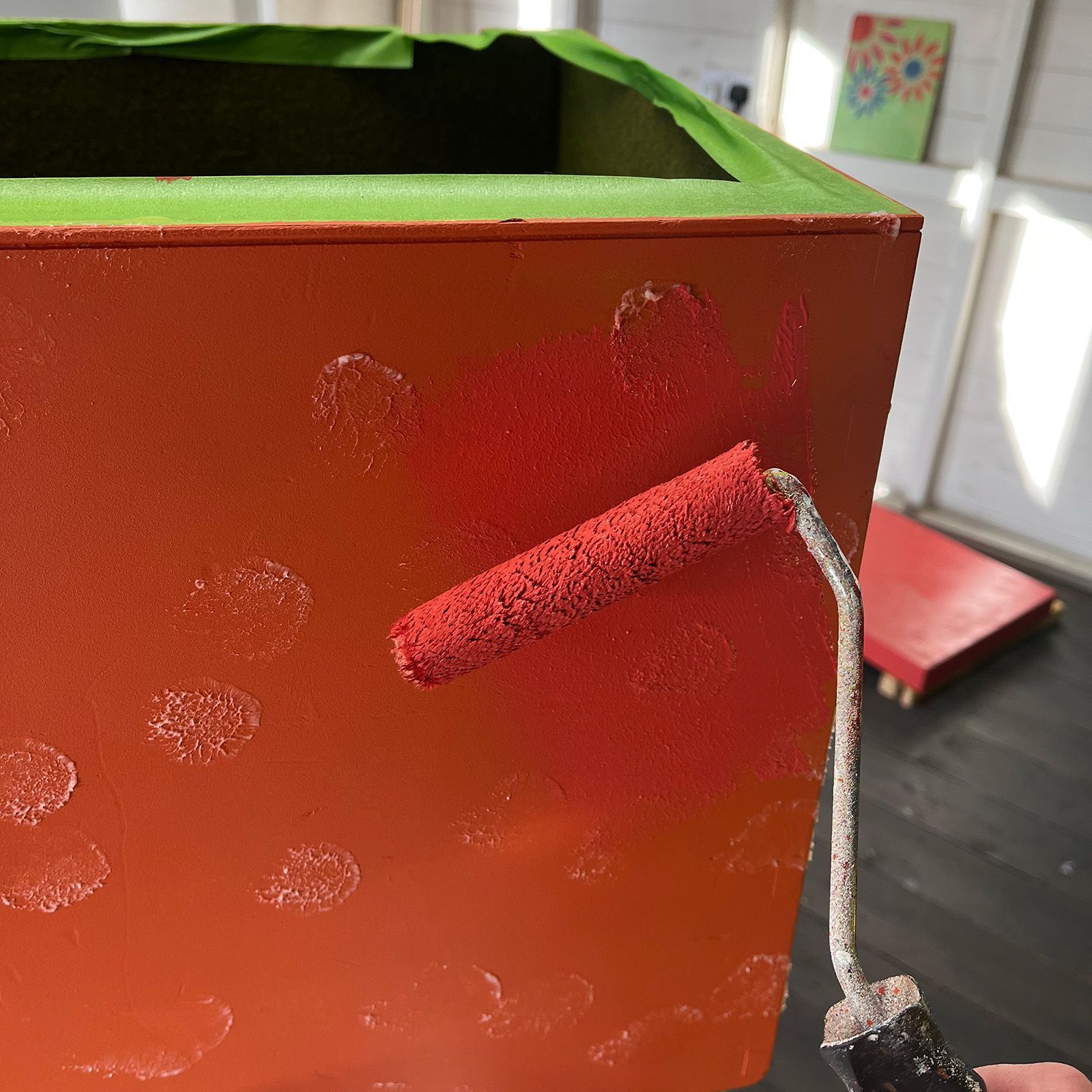 Rolling rose  paint over wax to get a bit of base colour through on the carnival chest.