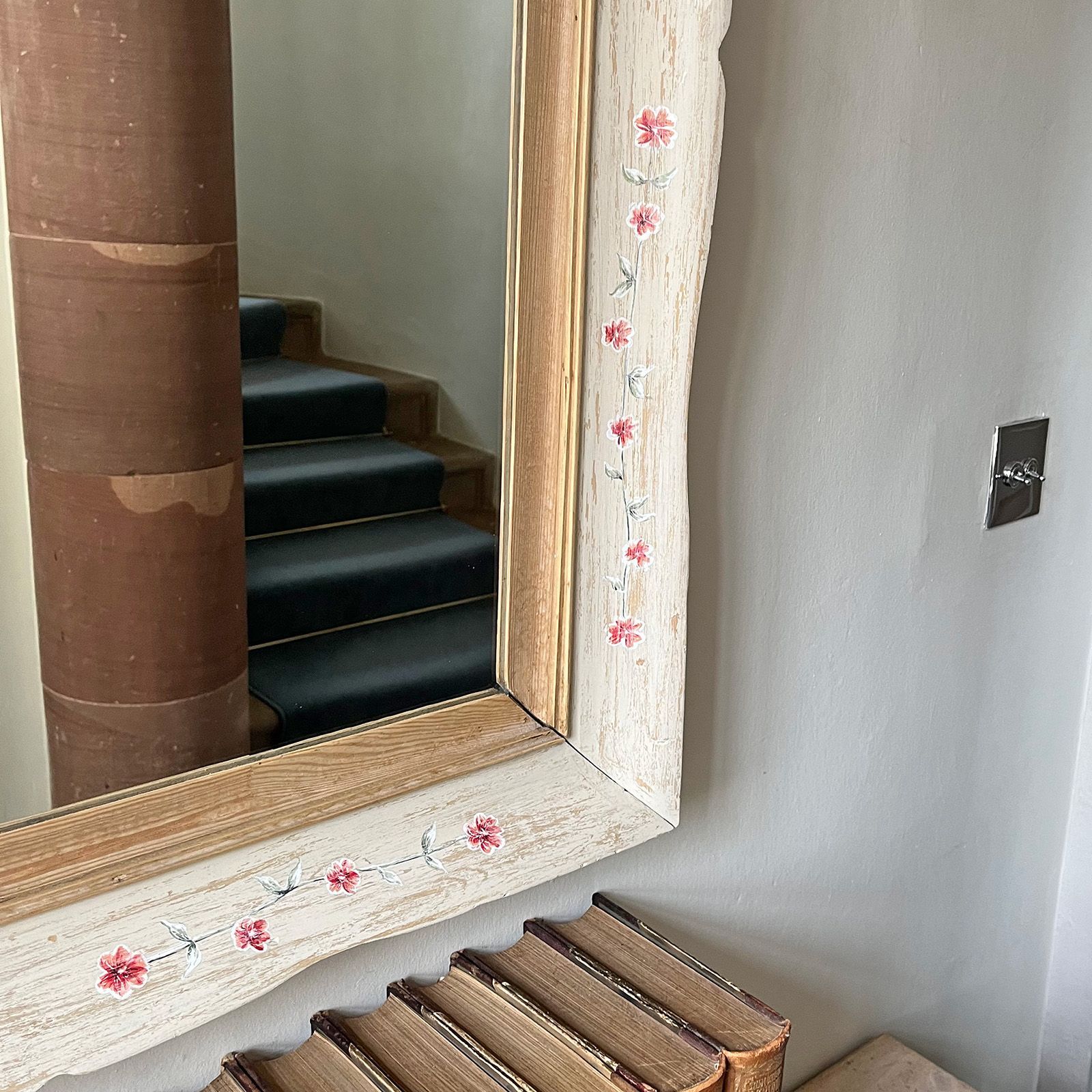 Handpainted flowers on upcycled garland mirror