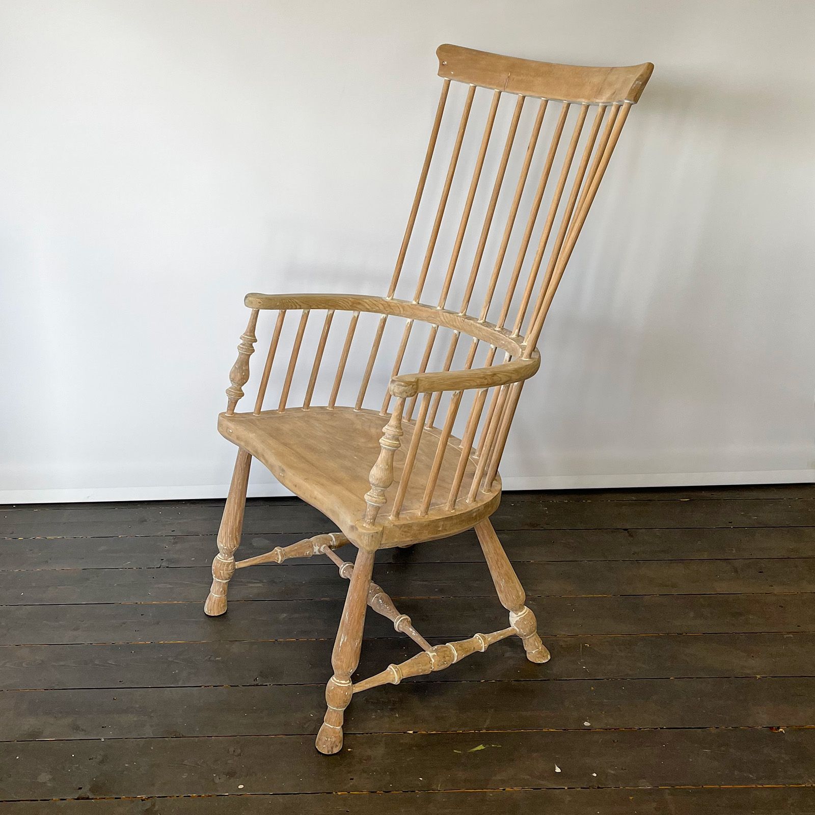 Windsor chair stripped of gloss paint ready to be upcycled