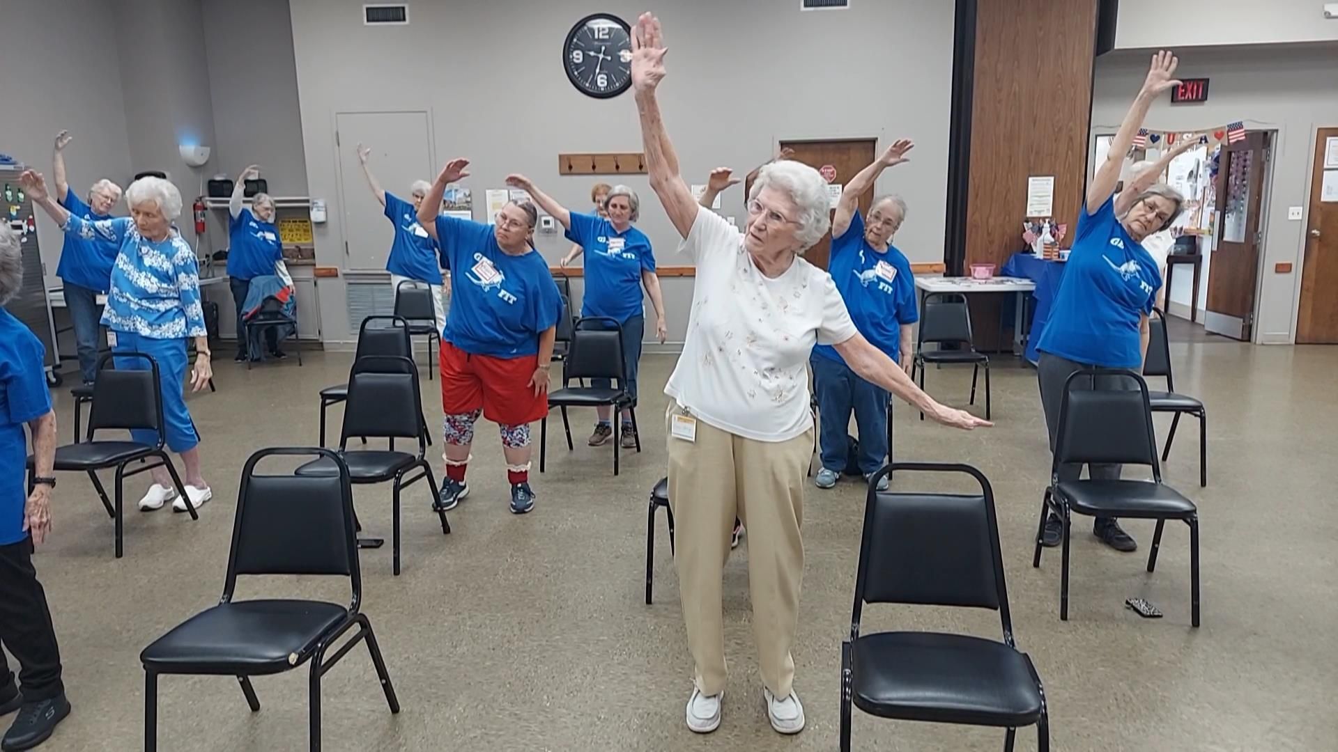 image of senior center clients in various Activities including bingo, 42 and exercise