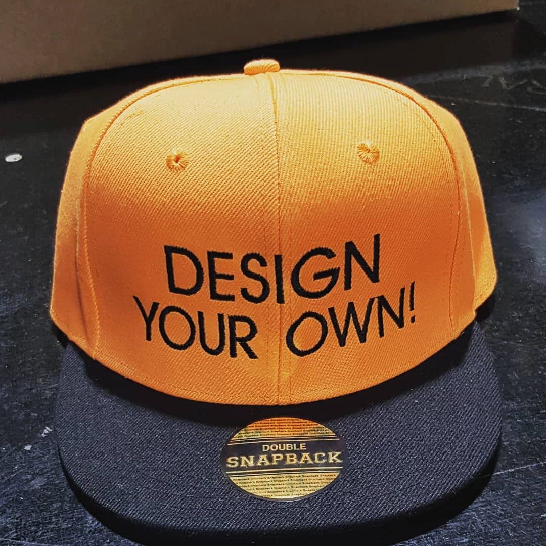 Snapback Hat With Printed Text on the Front — Workwise Clothing Forster in Forster, NSW