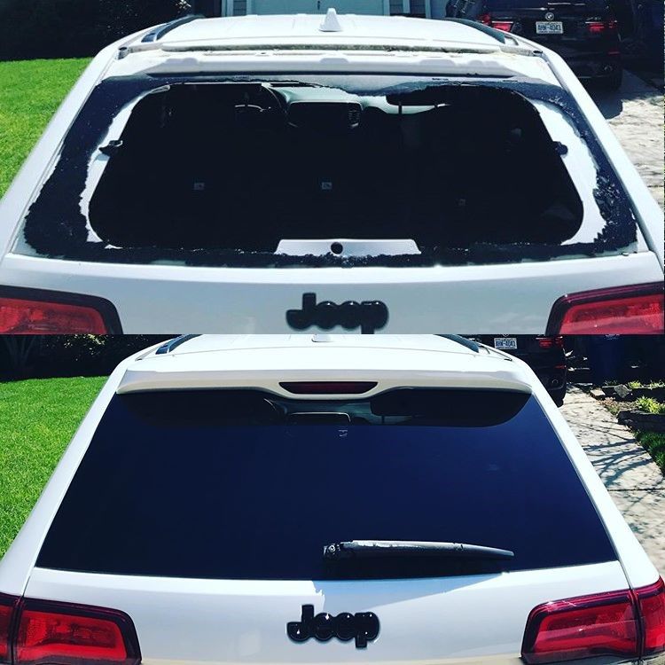A white jeep with the word jeep on the back