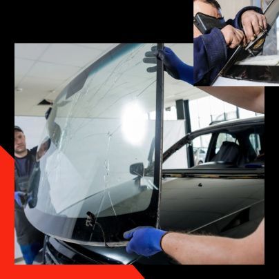 A man is installing a windshield on a car.