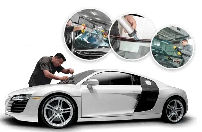 A man is working on the windshield of a white sports car.