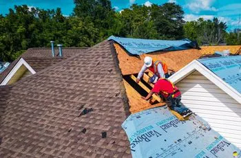 a house is being remodeled and the roof is being covered with a roofing material that says ' roof '