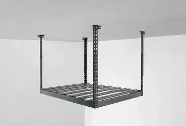 an overhead rack is hanging from the ceiling in a garage .