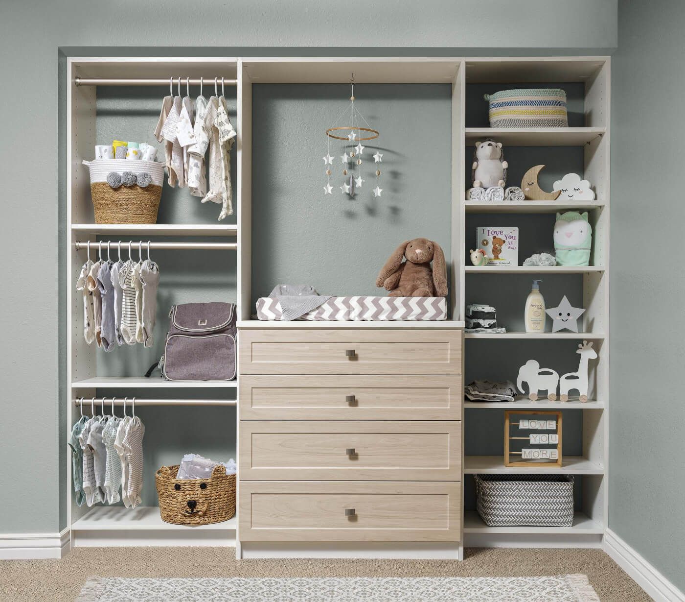 A cozy baby's room with a crib, dresser, shelves, and a kids closet.