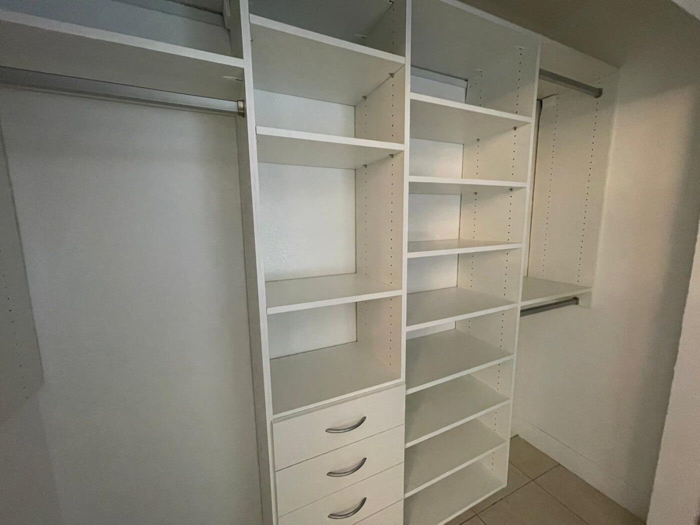 A empty Custom Closet system