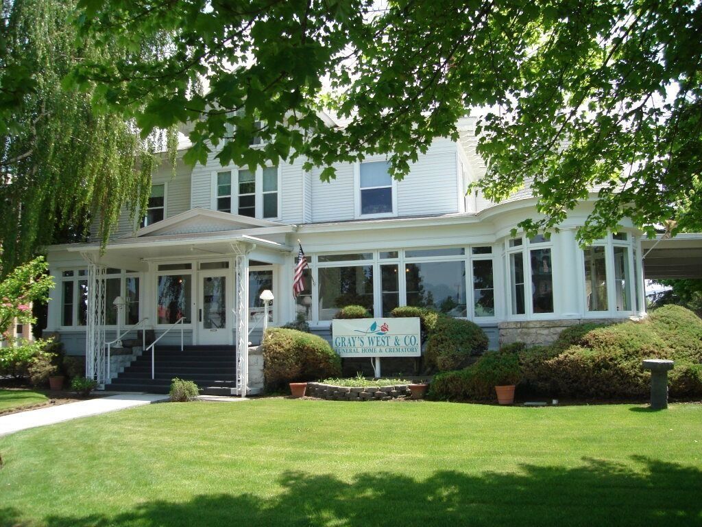 White house with wraparound porch