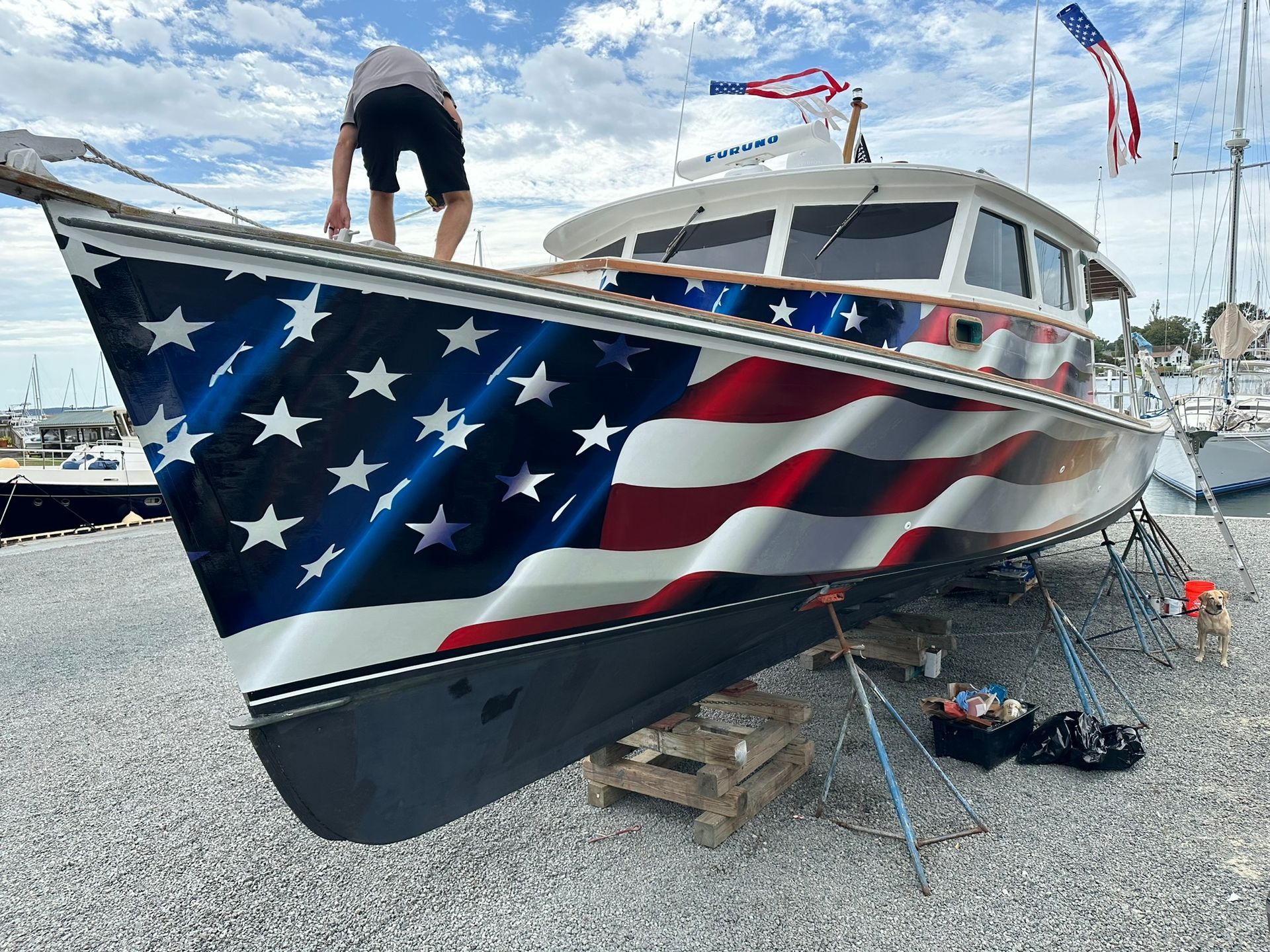 A boat with an american flag painted on it