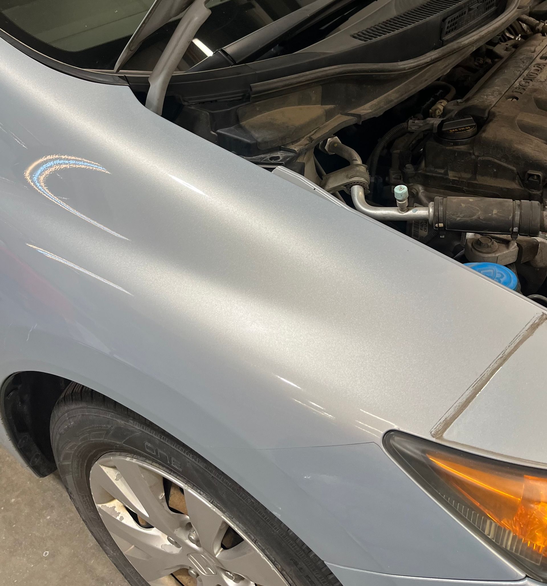 Honda Civic dent after paintless dent repair