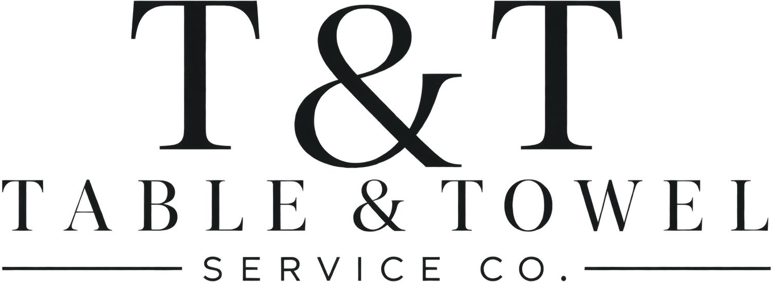 T&T Table & Towel service company logo in black serif text