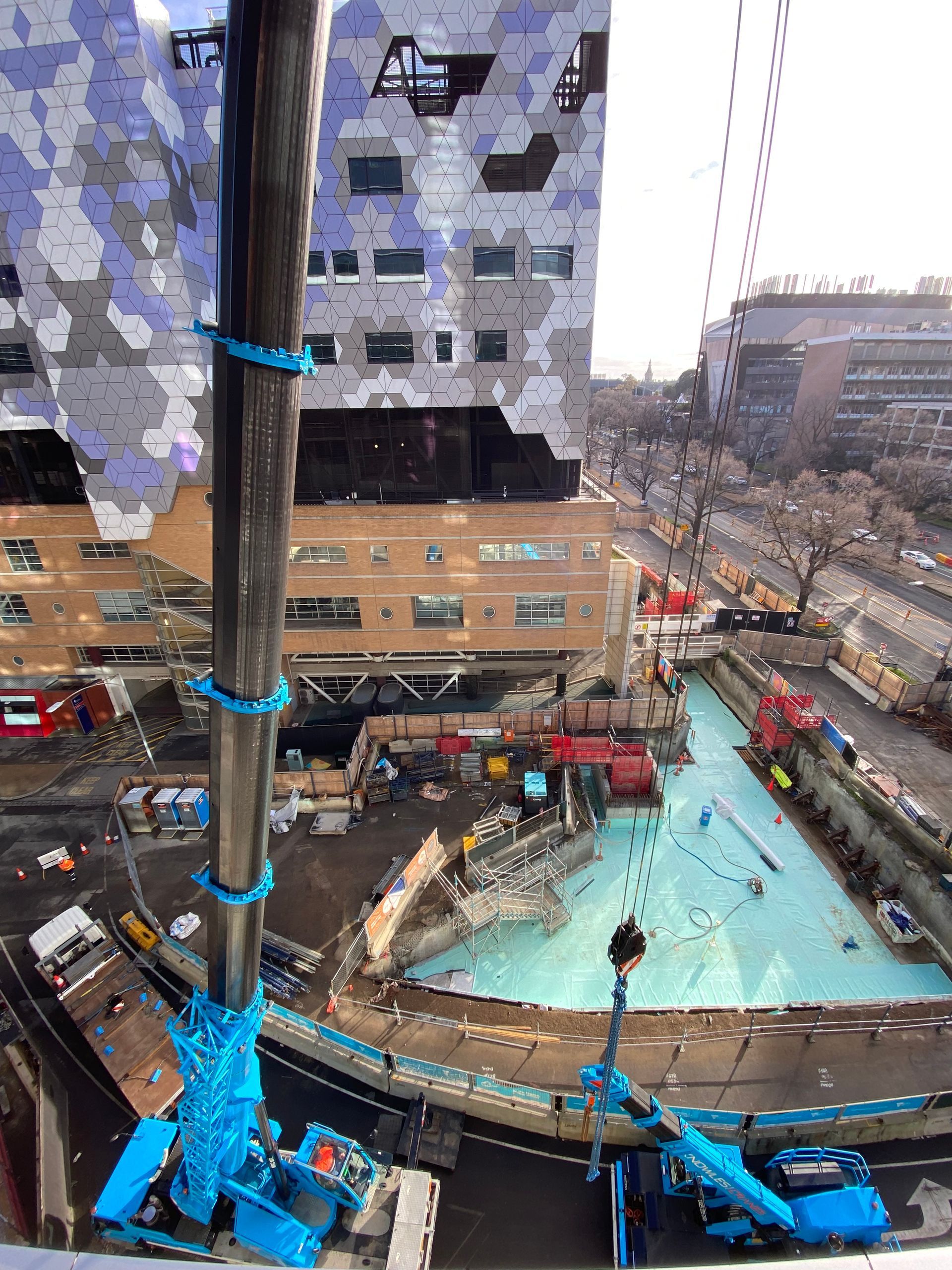 Crane assisting in construction