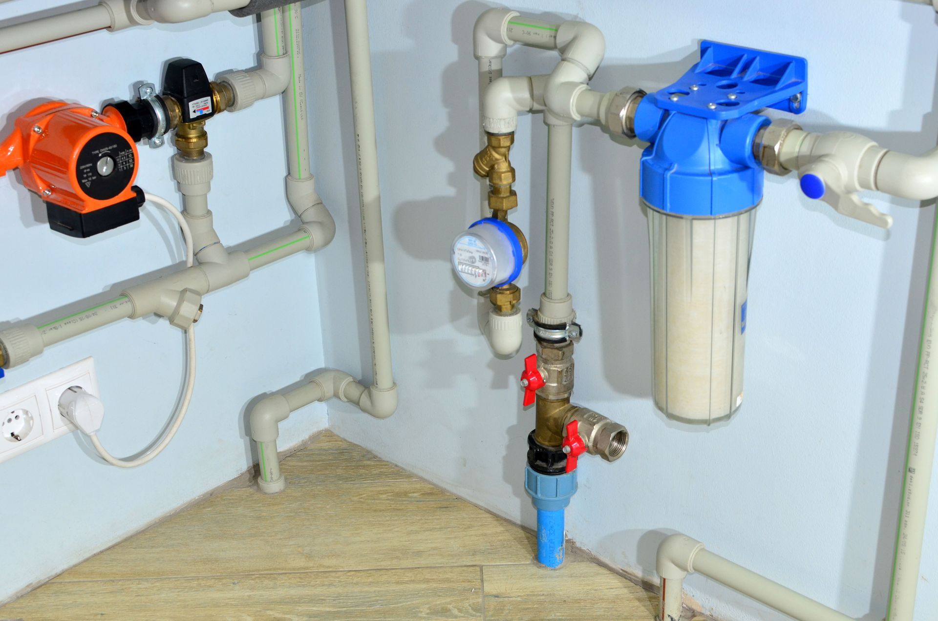 A room with a lot of pipes and a water filter in Atlanta, GA