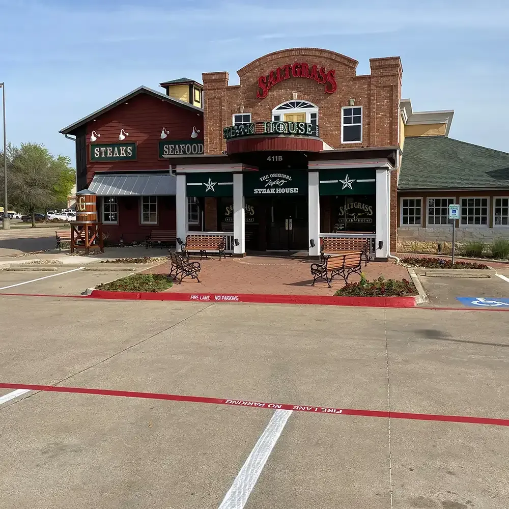 hatch lines and ADA parking lot markings in Kilgore TX