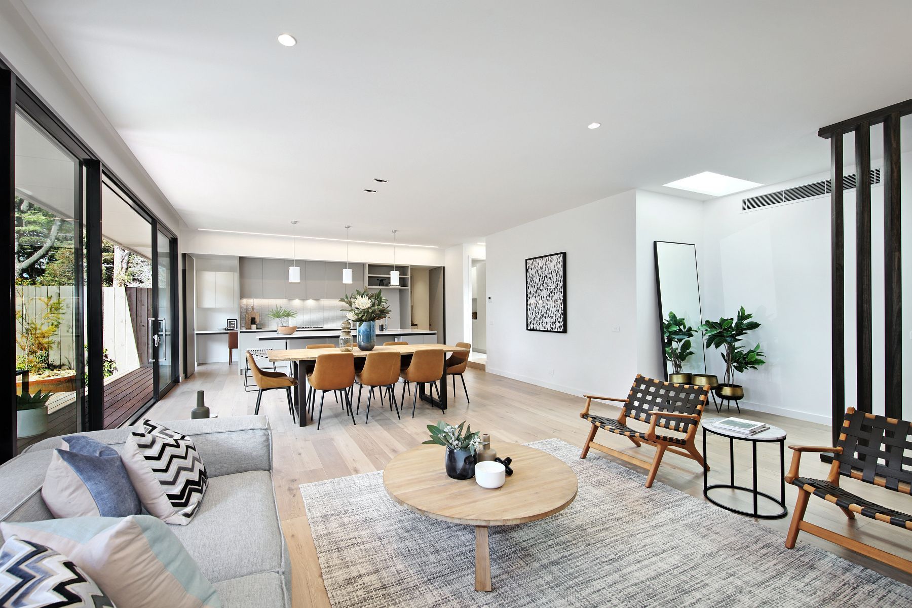 Bright Open-plan Living Room With Gray Sofa — KM Custom Homes In Mount Eliza, VIC