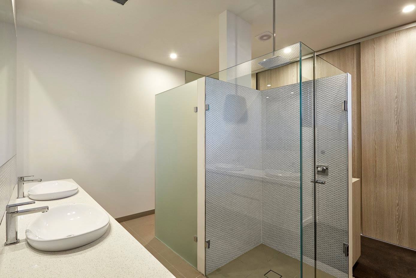 Modern Bathroom With Two White Sinks And A Glass Shower Stall — KM Custom Homes In Frankston South, VIC