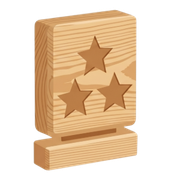Wooden award plaque with three star cutouts on a small base, in a light natural wood finish