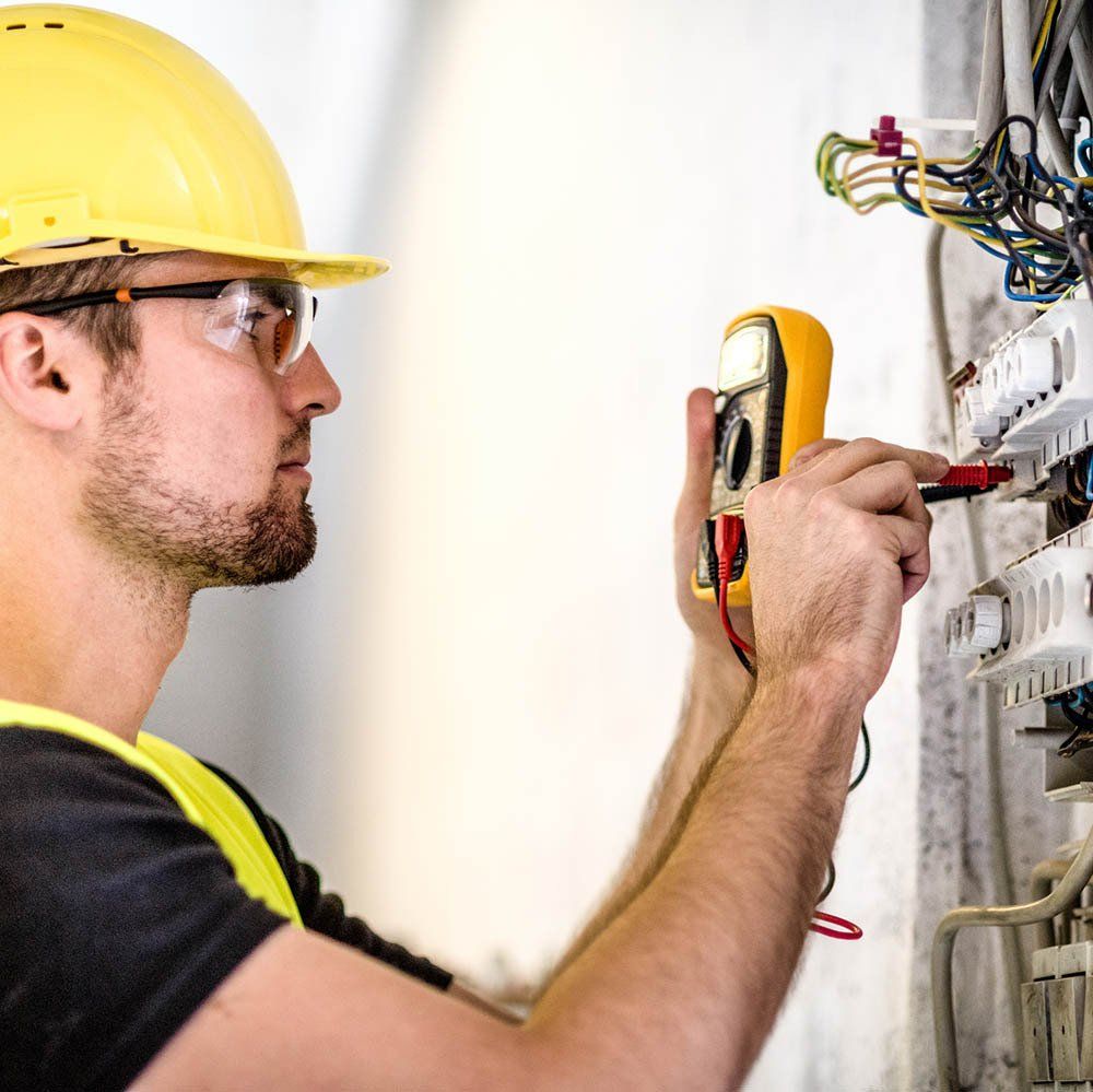 Technician Checking The Panel Box — South Holland, IL — Electrical Services Inc