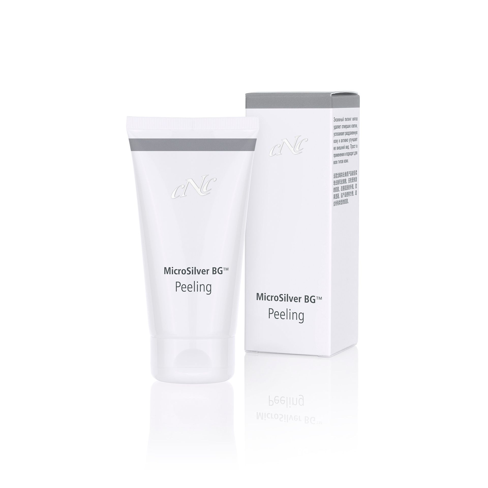 Eine Tube Peeling neben einer Schachtel auf einer weißen Fläche.