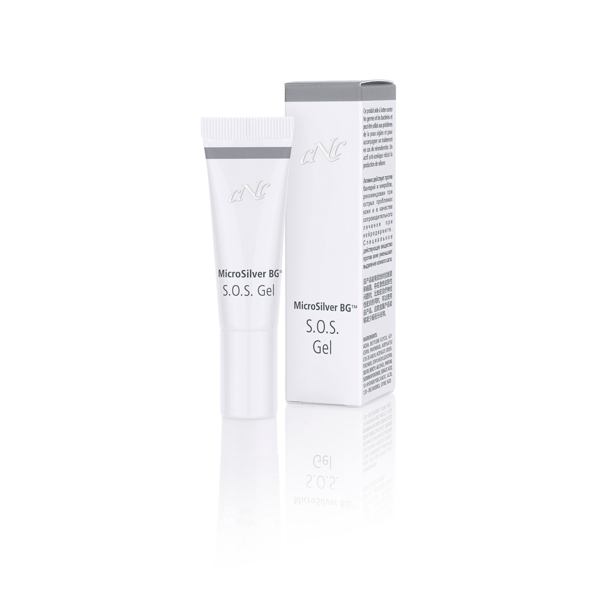 Eine Tube SOS-Gel neben einer Schachtel auf einer weißen Fläche.