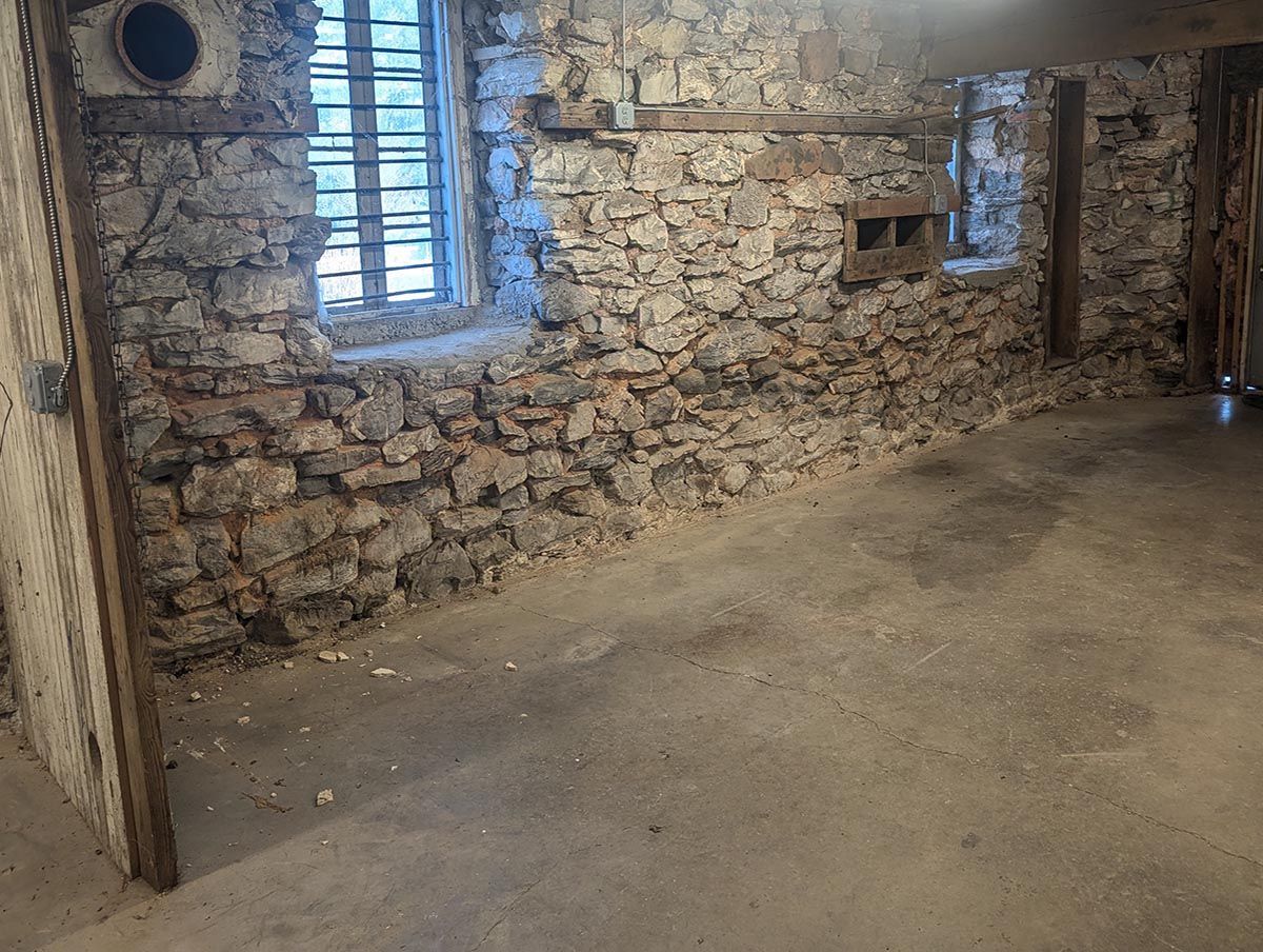 before stone wall renovation