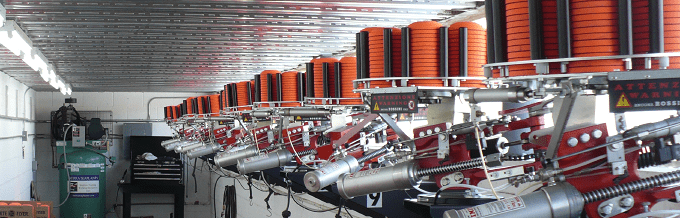 A room filled with lots of machinery and a ceiling.
