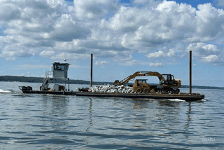 wards marine barge services transporting rocks on the chesapeake bay.