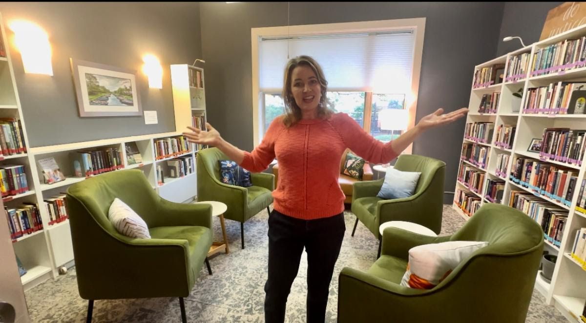 Reverend Erica in the library