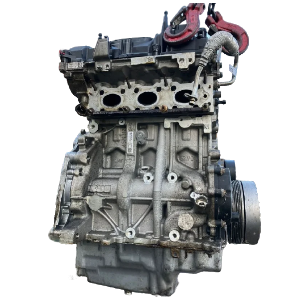 Engine block, metallic gray, with visible engine components.