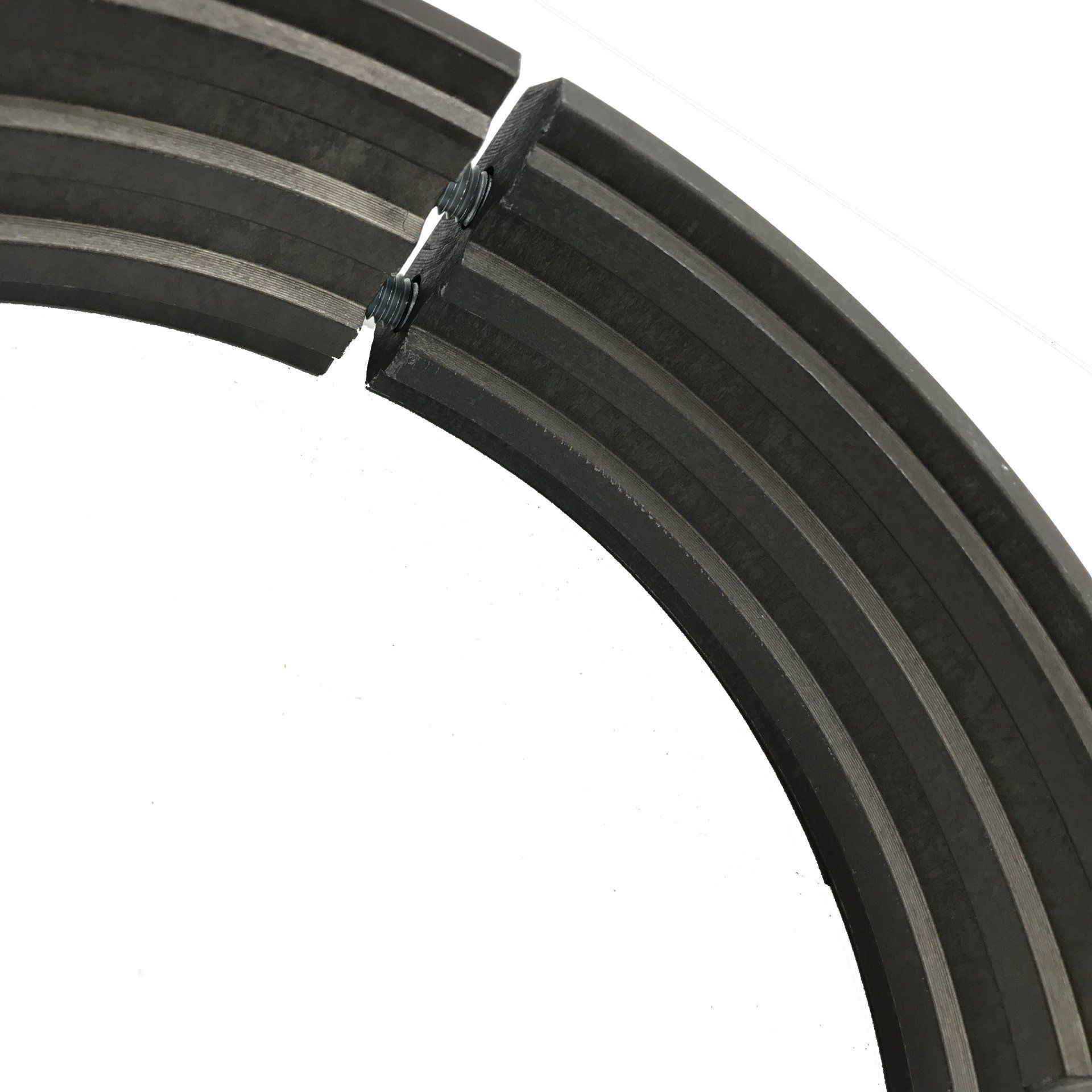 Close-up of a curved black metal track or rail segment on a white background
