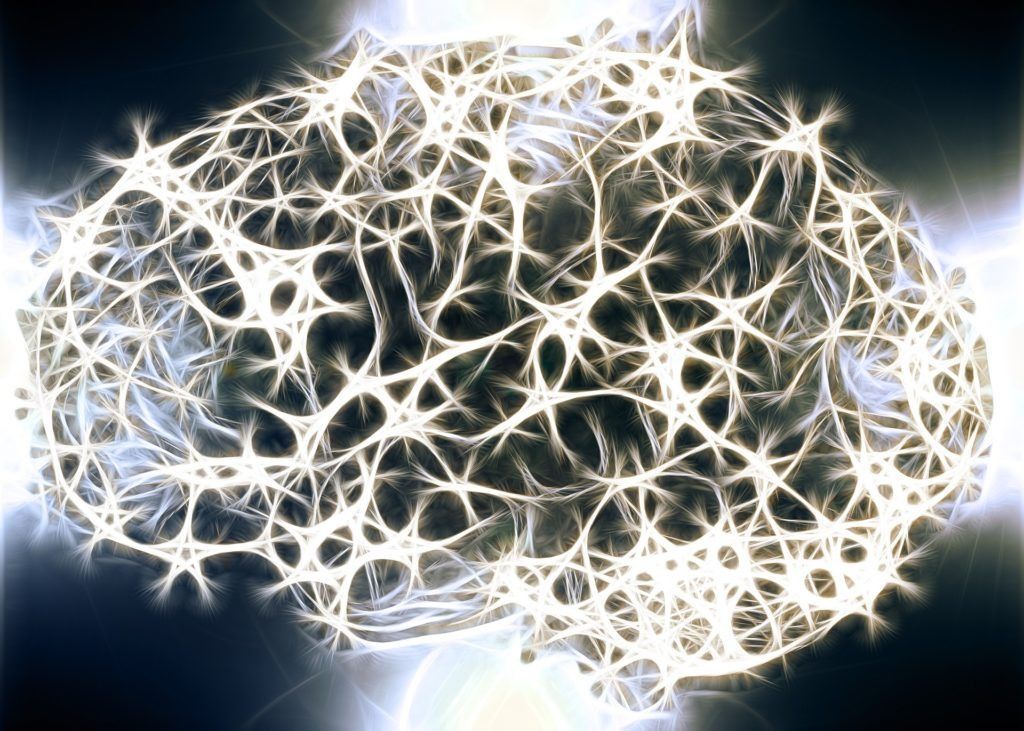 Abstract glowing white neural network or web-like structure on a dark background