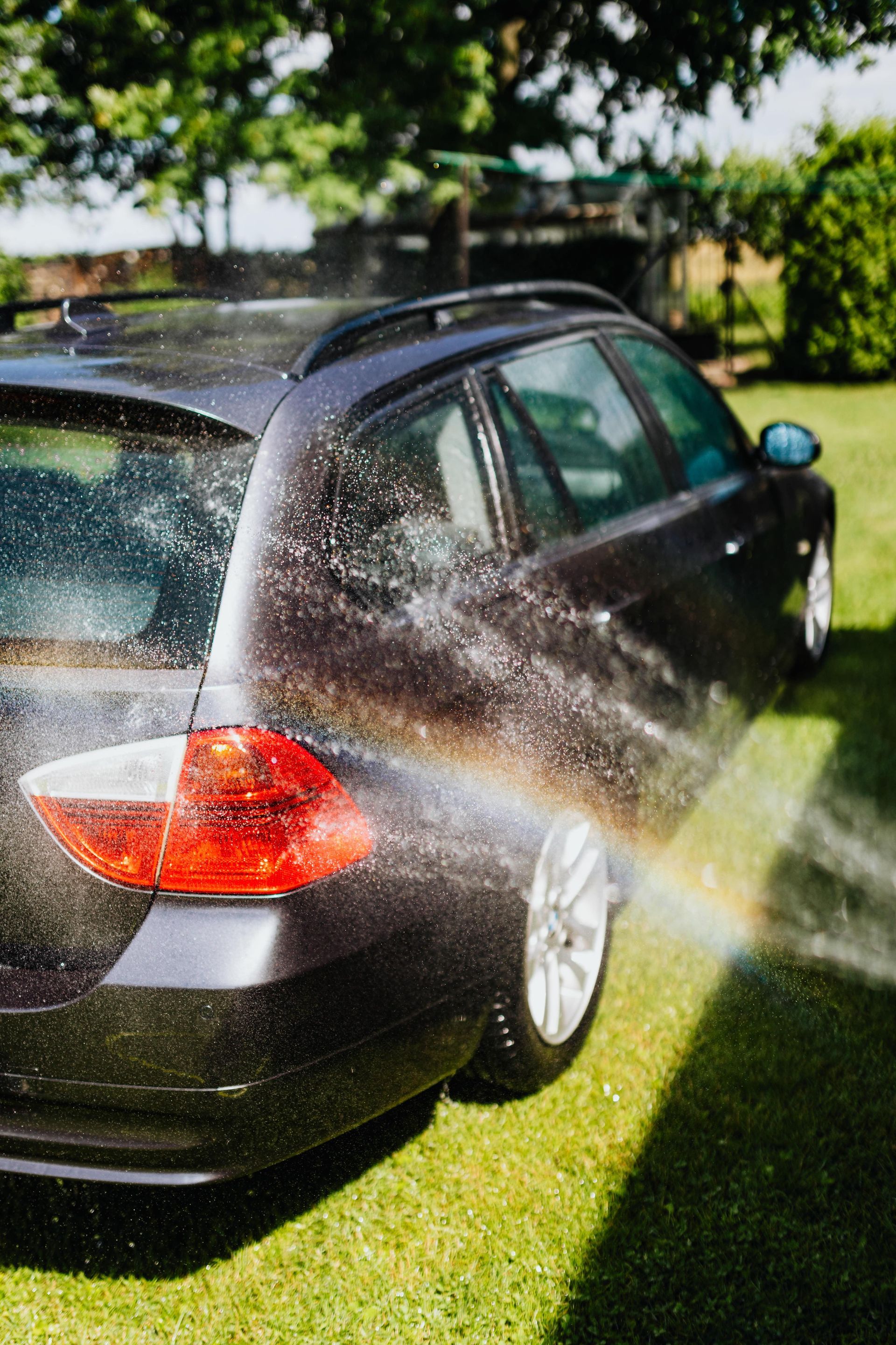 hand washing black car in Auburn AL