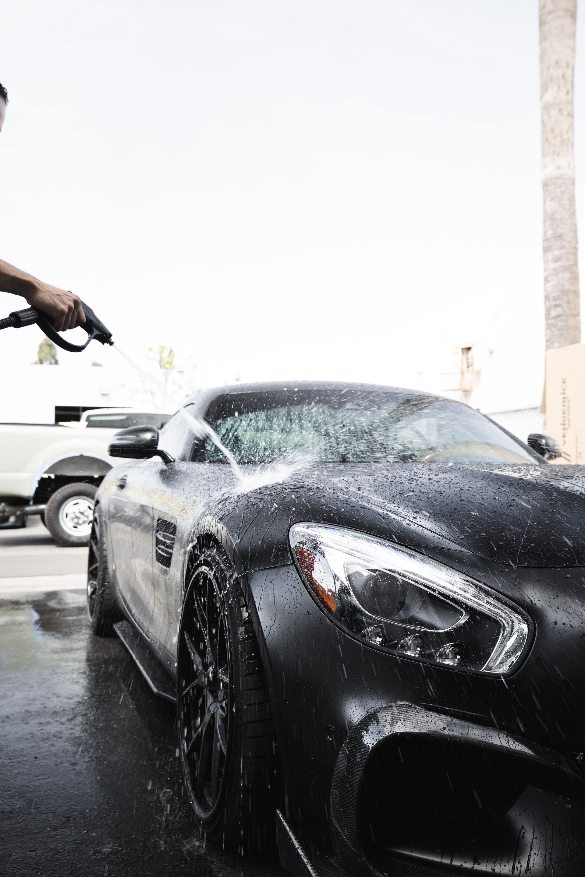 Final rinse on auto detailing job
