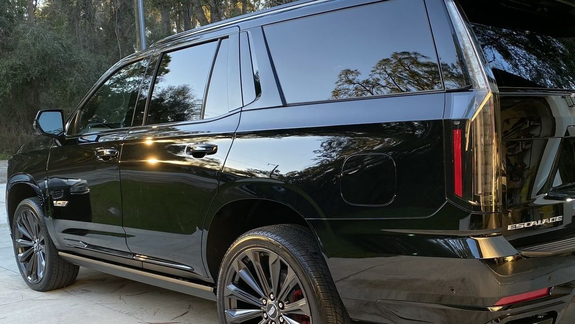 Polished car with showroom shine after mobile detailing.