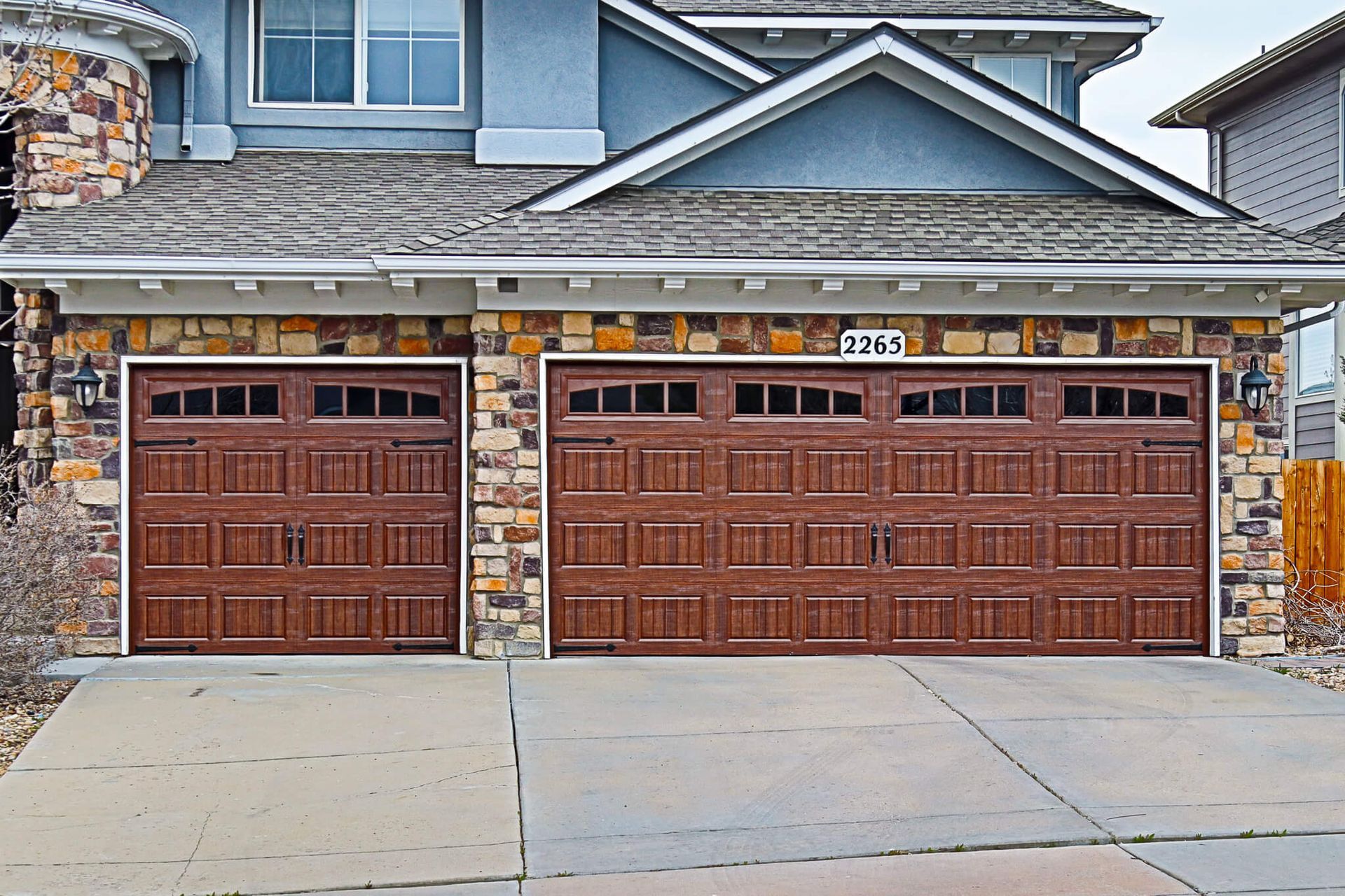 Rustic traditional wooden garage door classic bicycle in front