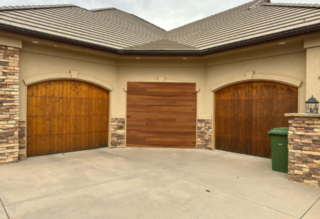 Denver garage door installation Blond woman smiling wearing red sun dress with two young boys portrait