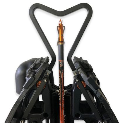 A crossbow with a heart shaped handle on it