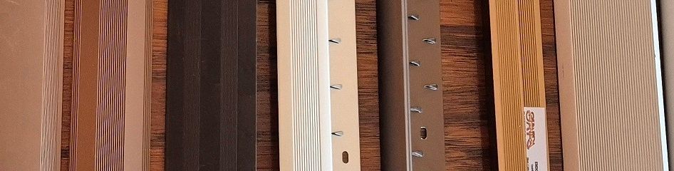 A bunch of different types of wood are stacked on top of each other.
