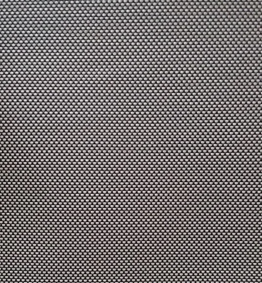 A close up of a gray fabric with a checkered pattern.
