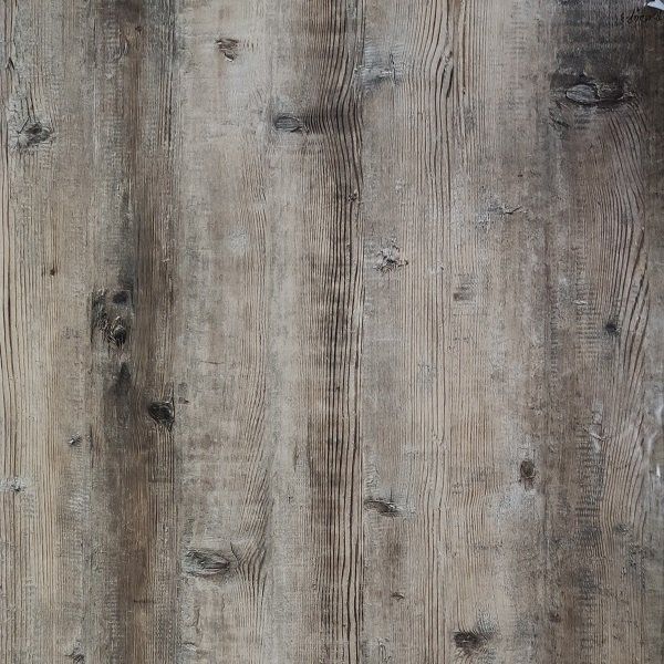 A close up of a wooden floor with a grainy texture.