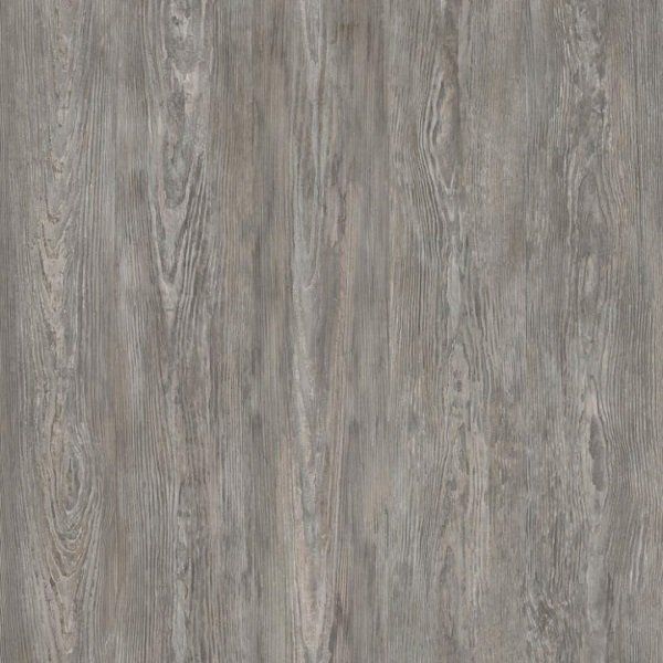 A close up of a gray wood grain floor.