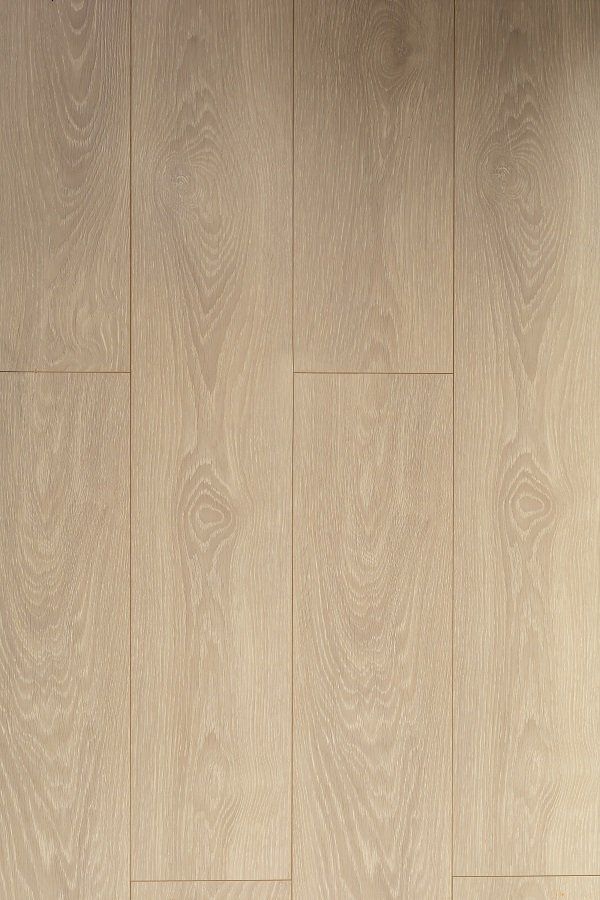 A close up of a wooden floor with a grain pattern.