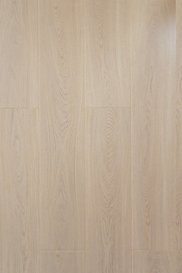 A close up of a white wooden floor.