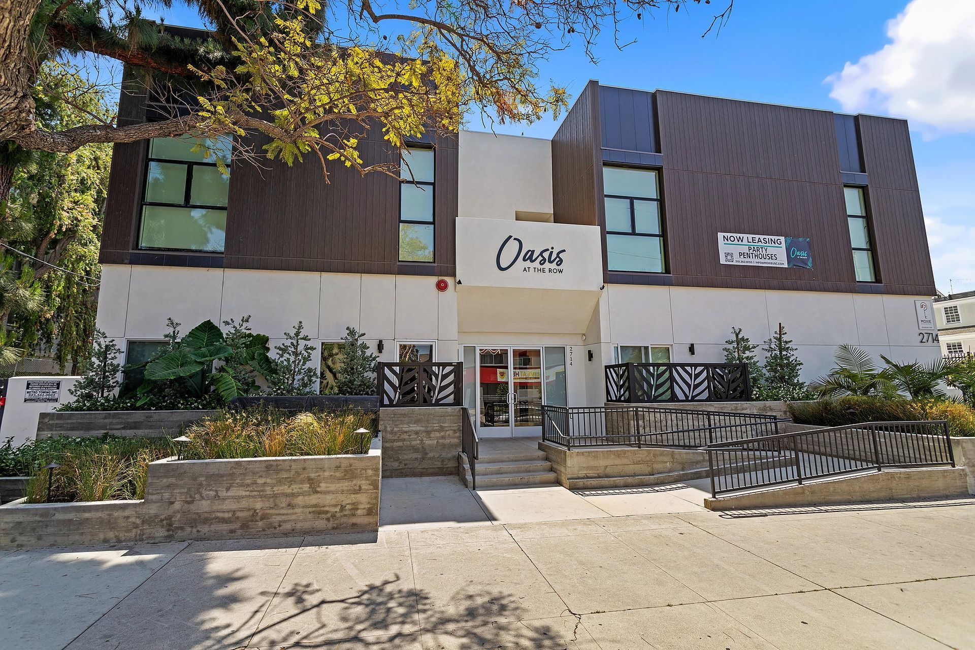 Oasis at the Row furnished apartments near USC, front exterior on Portland Street, Los Angeles