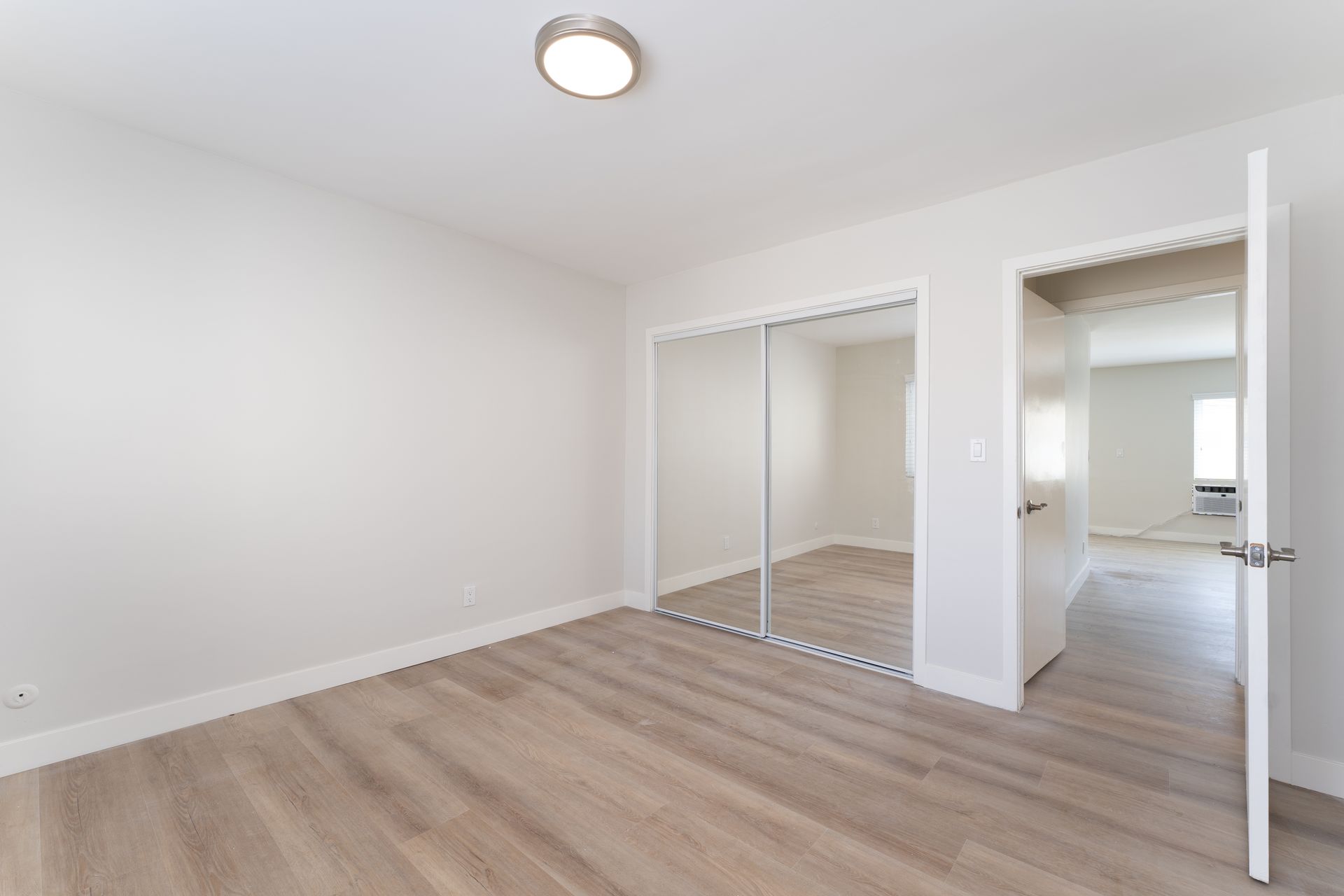 Apartment kitchen with stainless steel appliances at Oasis West