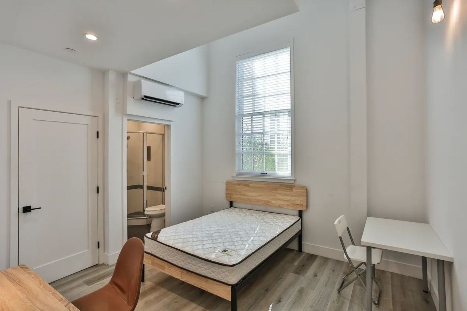 Modern apartment exterior at Oasis At The Orchard residential community