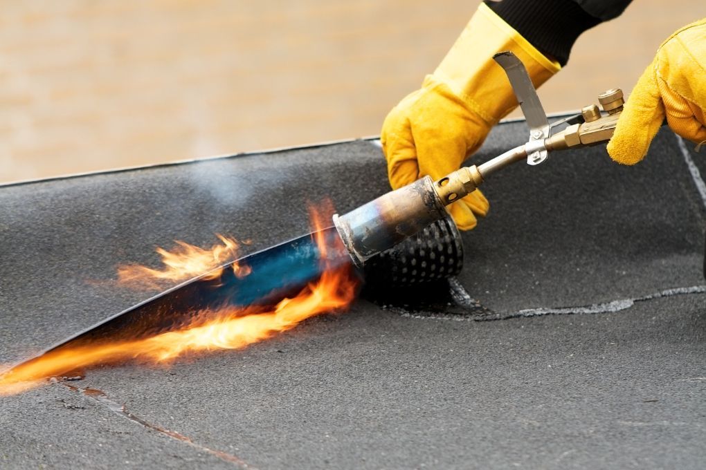Roofers Kilmarnock repairing a Bitumen flat roof